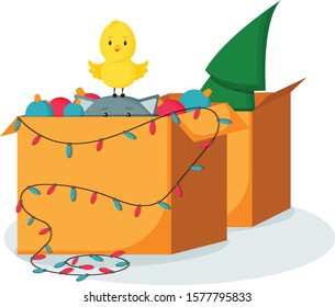 The cat is hiding in a box with Christmas toys. A bird on the cat's head. Christmas tree in a box in the background. Christmas card. Template for the sale of Christmas goods. Seasonal sale. Isolated o