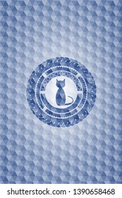 cat icon inside blue emblem with geometric pattern.