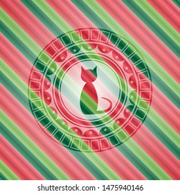 cat icon inside christmas style emblem.