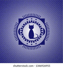 cat icon inside emblem with denim texture