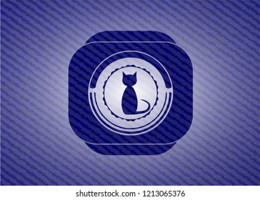 cat icon inside emblem with jean background