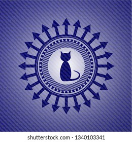 cat icon inside emblem with jean background
