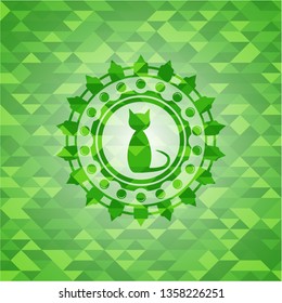 cat icon inside green emblem with triangle mosaic background