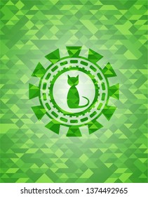 cat icon inside green emblem with mosaic background