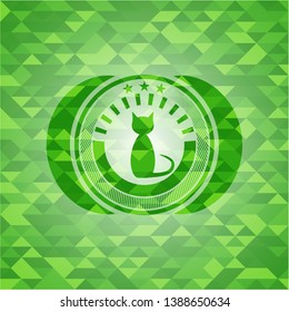 cat icon inside green emblem with mosaic background