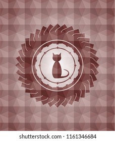 cat icon inside red seamless emblem with geometric pattern.