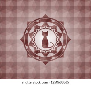 cat icon inside red seamless emblem with geometric pattern.