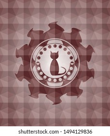 cat icon inside red seamless badge with geometric pattern.
