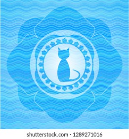 cat icon inside sky blue water wave emblem background.
