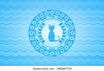 cat icon inside sky blue water emblem. 