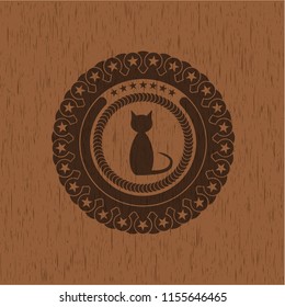 cat icon inside vintage wooden emblem