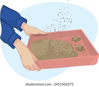 Katzentoilette. menschliche Hand, die den Sand der Katze schüttelt, bevor sie ihn reinigt.