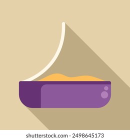 La caja de arena para gatos con una cuchara llena de arena está de pie sobre fondo beige