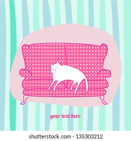 cat lying on a sofa