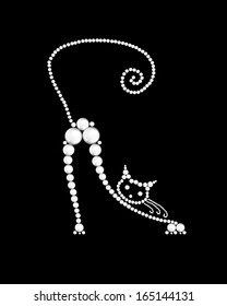 Cat made from white pearls on black