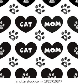 Cat mom and cute black hearts and doodle paws. Happy Mother's Day background, fabric design seamless pattern.