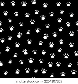 Cat paw print vector illustration. Dog, different black animal footprints on a white background. Seamless pattern of animal paws. white on black background