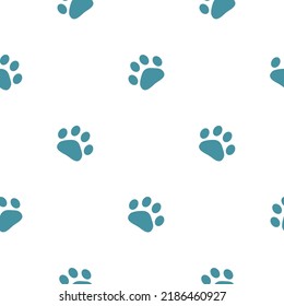 Cat paw seamless pattern blue colored in flat style. Beautiful hand drawn loopable kitten footprint illustration background