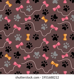 Cat paw seamless vector pattern. Cat footprint and bones texture.  Pattern wallpaper background.  Seamless pattern with cat paw footprint, toys and bows. Vector illustration.