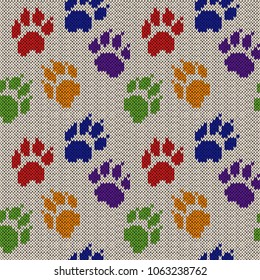 Cat paw tracks, knitting seamless pattern for the fabric texture or handmade design