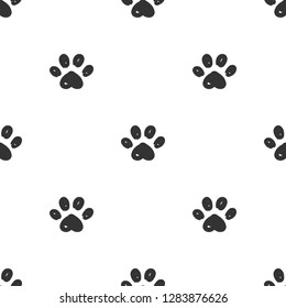 Cat paws prints seamless pattern. Vector illustration.