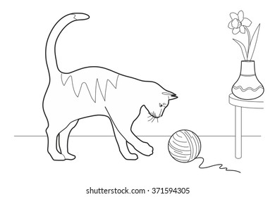 Cat playing with a ball of wool
