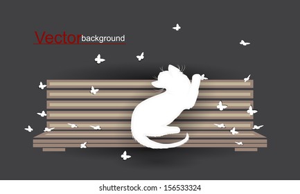 Cat playing with butterfly