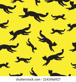 cat seamless pattern on yellow background. good to print on textile and wallpaper.