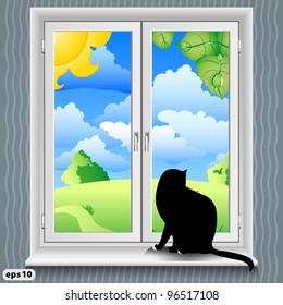 A cat sits on the windowsill. Summer.