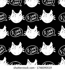 cat vector seamless in black and white colors.Wallpaper background with cartoon kitty muzzles. Pattern for textile, wrapping and etc.