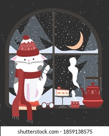 Cat winter time cozy home and tea