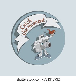 Catch the moment. Funny camera. Emblem, sticker. Design for printing on fabric or paper.