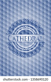 Cathedral blue badge with geometric pattern.