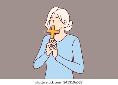 Catholic woman kisses christian cross, making ritual worshiping religious shrine and expressing respect to lord. Catholic girl with crucifix in hands thanks god for remission sins or makes confession