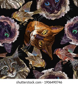 Cats and birds. Embroidery seamless pattern. Fashionable template for design of clothes, t-shirt design, tapestry 