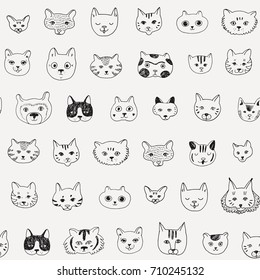 Cats faces cartoon doodle vector seamless pattern.