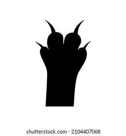 A cat's paw with sharp claws. The kitty is scratching. Home pet. Silhouette of a cat's paw. Black solid vector icon.