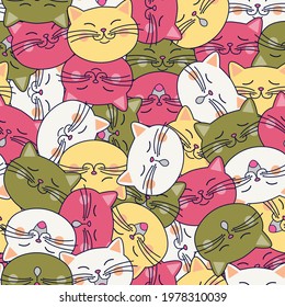 Cats seamless background. Cat face. Cartoon vector seamless wallpaper. Funny cartoon cats. Seamless pattern.Texture for fabric, wrapping, wallpaper. Decorative print. Vector illustration.