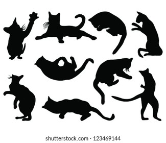Cats silhouettes in different poses, vector