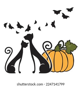 cats sitting surrounded by bats and pumpkin