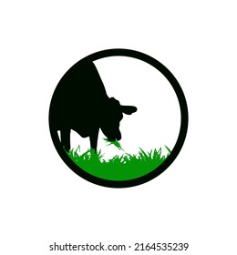 Cattle farm logo. Cow eating green grass icon. Silhouette vector illustration.
