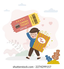 Caucasian boy holds popcorn and ticket and goes to the cinema. Happy preschooler wants to watch movie. Entertainment, enjoying new movie. Handsome male character. flat vector illustration