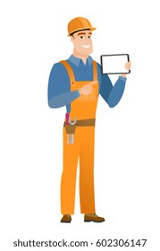 Caucasian builder holding tablet computer. Full length of happy builder pointing at tablet computer. Young builder with tablet computer. Vector flat design illustration isolated on white background.