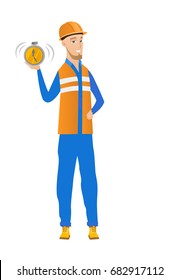 Caucasian builder showing ringing alarm clock. Full length of young builder with alarm clock. Happy builder holding alarm clock. Vector flat design illustration isolated on white background.
