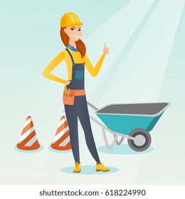 Caucasian builder showing thumb up while standing near wheelbarrow. Young builder in hard hat giving thumb up. Builder at work on construction site. Vector flat design illustration. Square layout.