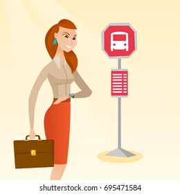 Caucasian business woman waiting for a bus at the bus stop. Young cheerful woman standing at the bus stop. Woman looking at her watch at the bus stop. Vector cartoon illustration. Square layout.
