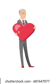 Caucasian businessman showing big heart. Full length of senior businessman with heart shape. Happy businessman holding a red heart. Vector flat design cartoon illustration isolated on white background