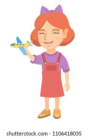 Caucasian cheerful girl playing with a toy airplane. Full length of happy smiling little girl with a toy plane. Vector sketch cartoon illustration isolated on white background.