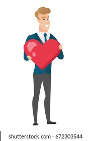 Caucasian groom in a wedding suit showing a big red heart. Full length of young groom with heart shape. Happy groom holding a red heart. Vector flat design illustration isolated on white background