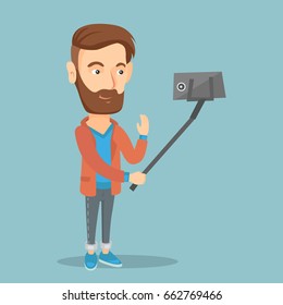 Caucasian hipster man with beard making selfie with a selfie-stick. Smiling man taking photo with a cellphone. Young man taking selfie and waving hand. Vector flat design illustration. Square layout.